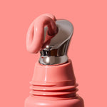 Close-up of INIKA Organic Tinted Lip Serum applicator