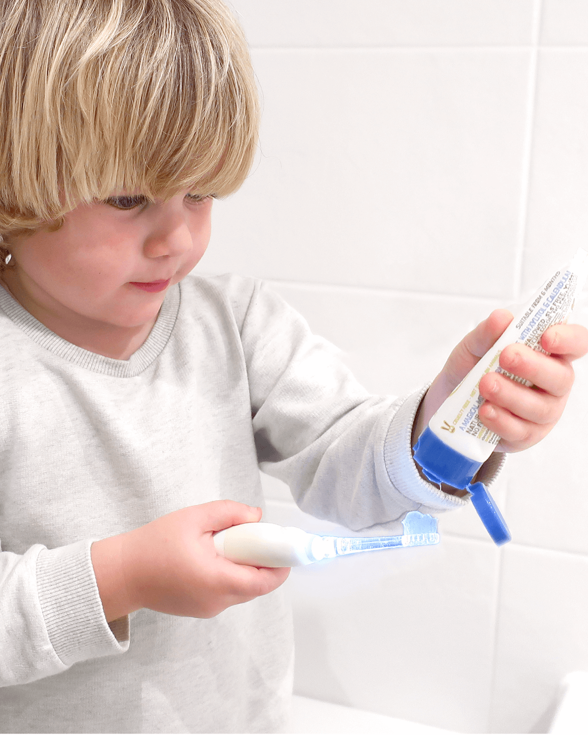 Child using Jack N' Jill bubblegum toothpaste