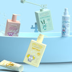 Colourful Jack N' Jill children's bath products arranged around a small blue bathtub, including baby wash, shampoo and body wash, bubble bath and spray.