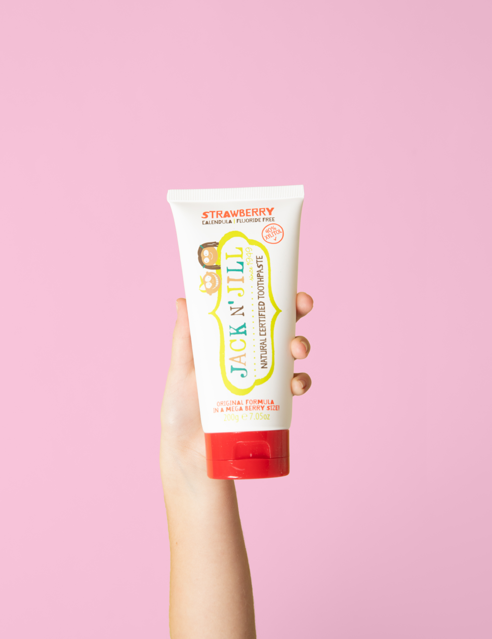 Jack N' Jill Mega Berry toothpaste in a bright lifestyle scene