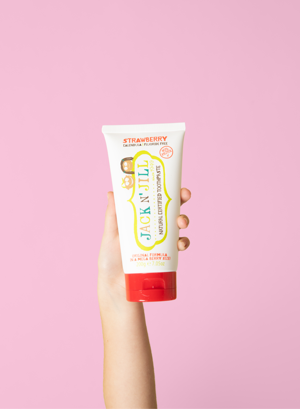 Jack N' Jill Mega Berry toothpaste in a bright lifestyle scene