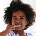 Child brushing with the Jack N' Jill Stage 3 tooth and gum brush