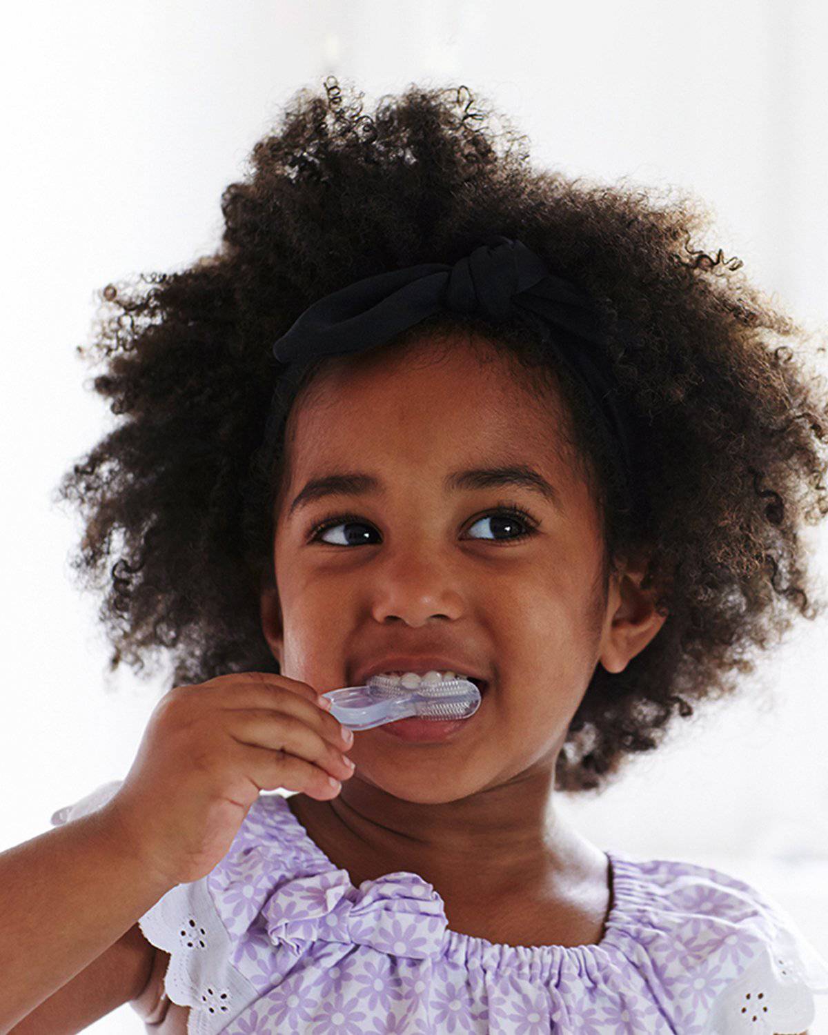 Child brushing with the Jack N' Jill Stage 3 tooth and gum brush