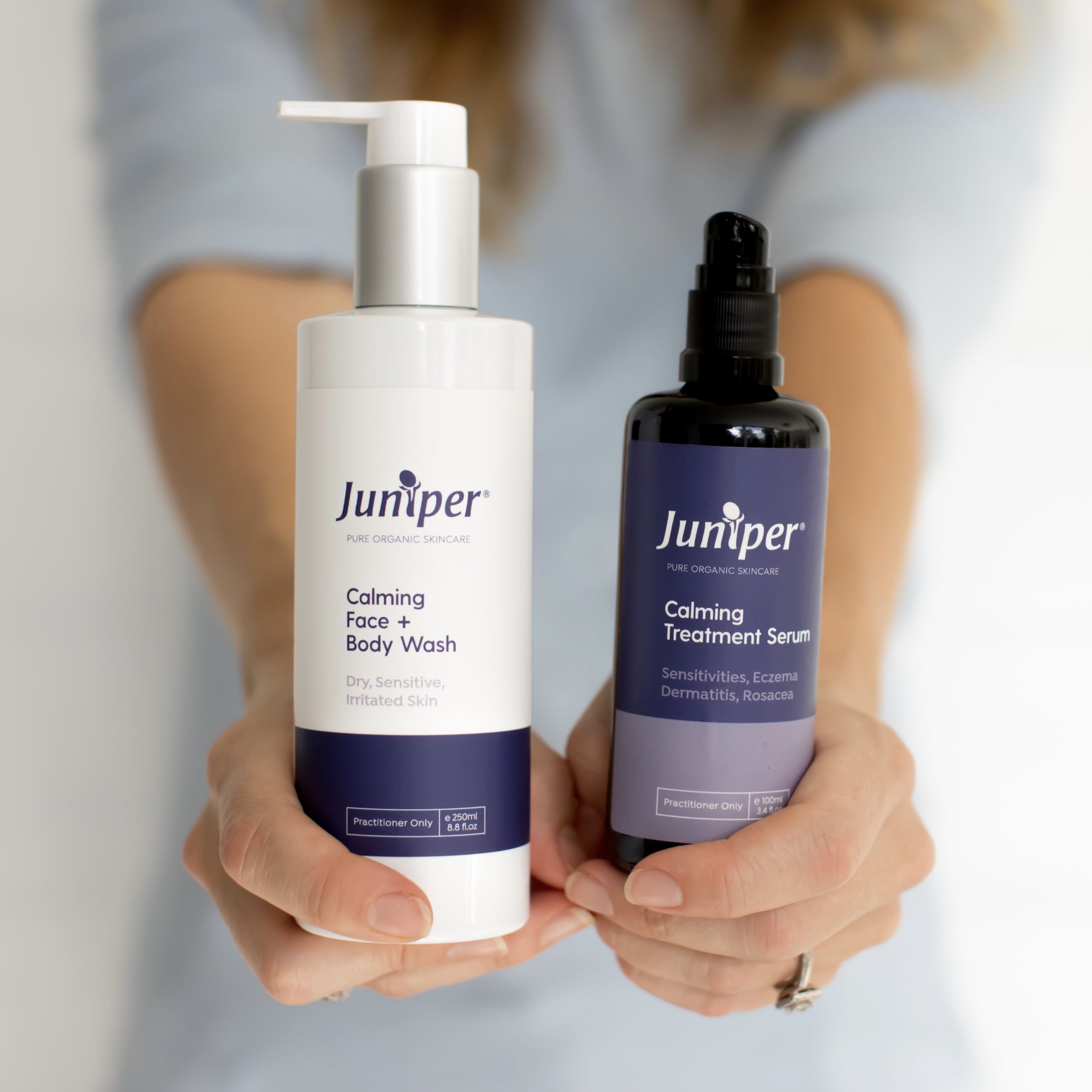 Person holding Juniper Calming Face and Body Wash