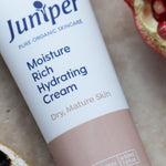 Juniper Moisture Rich Hydrating Cream styled with pomegranate and citrus