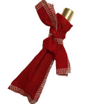 Fresca Kimono Natural Parfum wrapped in red fabric