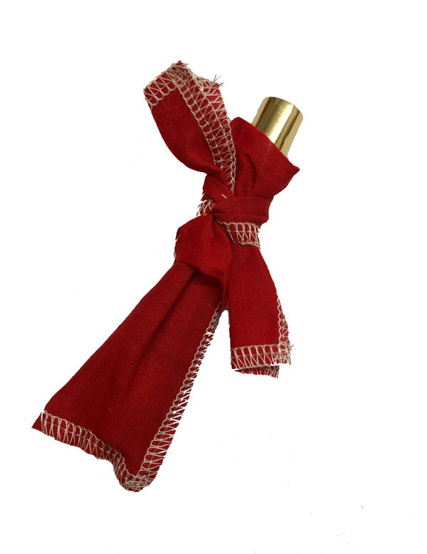 Fresca Kimono Natural Parfum wrapped in red fabric