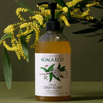 Koala Eco Lemon Myrtle and Mandarin Dish Soap styled with golden wattle flowers
