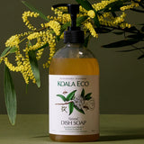 Koala Eco Lemon Myrtle and Mandarin Dish Soap styled with golden wattle flowers
