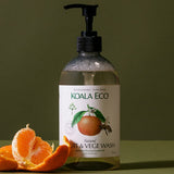 Koala Eco Mandarin Fruit and Vegetable Wash styled with fresh mandarins