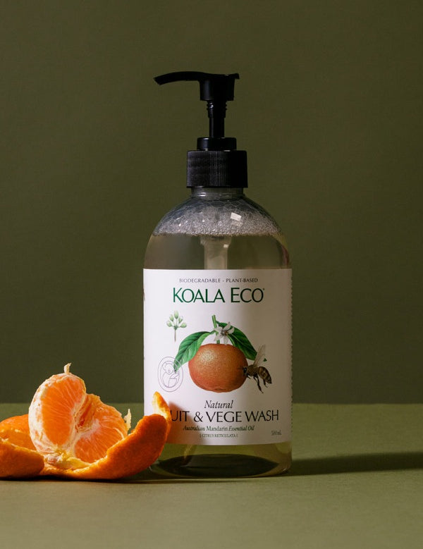 Koala Eco Mandarin Fruit and Vegetable Wash styled with fresh mandarins