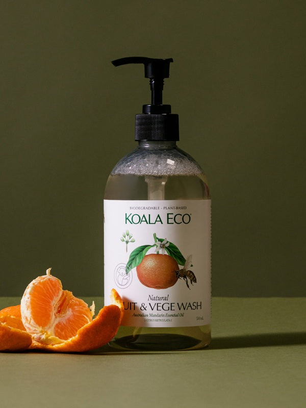Koala Eco Mandarin Fruit and Vegetable Wash styled with fresh mandarins