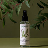 Koala Eco Lemon Scented Tea Tree Hand and Surface Spray styled beneath eucalyptus branches