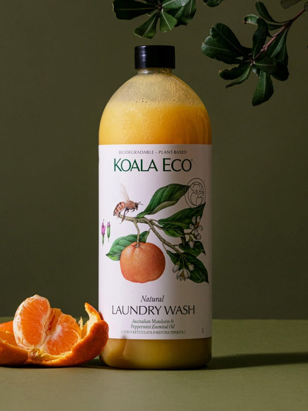 Koala Eco Mandarin and Peppermint Laundry Wash styled with fresh mandarin fruit