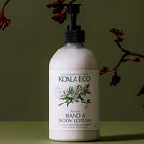 Koala Eco Terra Botanica Gift Pack Rosalina & Peppermint 2pk: the included 500ml hand and body lotion pump bottle displayed with botanical branches against an olive green background.