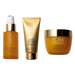 KORA Organics Turmeric Glow Trio: Turmeric Glow Foaming Cleanser, Brightening and Exfoliating Scrub and Mask, and Glow Moisturiser.