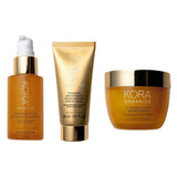 KORA Organics Turmeric Glow Trio: Turmeric Glow Foaming Cleanser, Brightening and Exfoliating Scrub and Mask, and Glow Moisturiser.