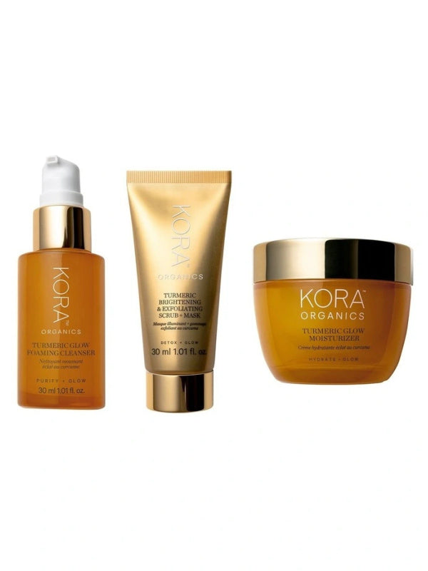 KORA Organics Turmeric Glow Trio: Turmeric Glow Foaming Cleanser, Brightening and Exfoliating Scrub and Mask, and Glow Moisturiser.