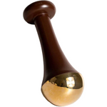 The LAMAV Ayurvedic Kansa Wand features a brown handle with a flared design and a rounded, shiny gold-colored tip, ideal for facial massage to support lymphatic drainage and promote radiant, healthy skin.