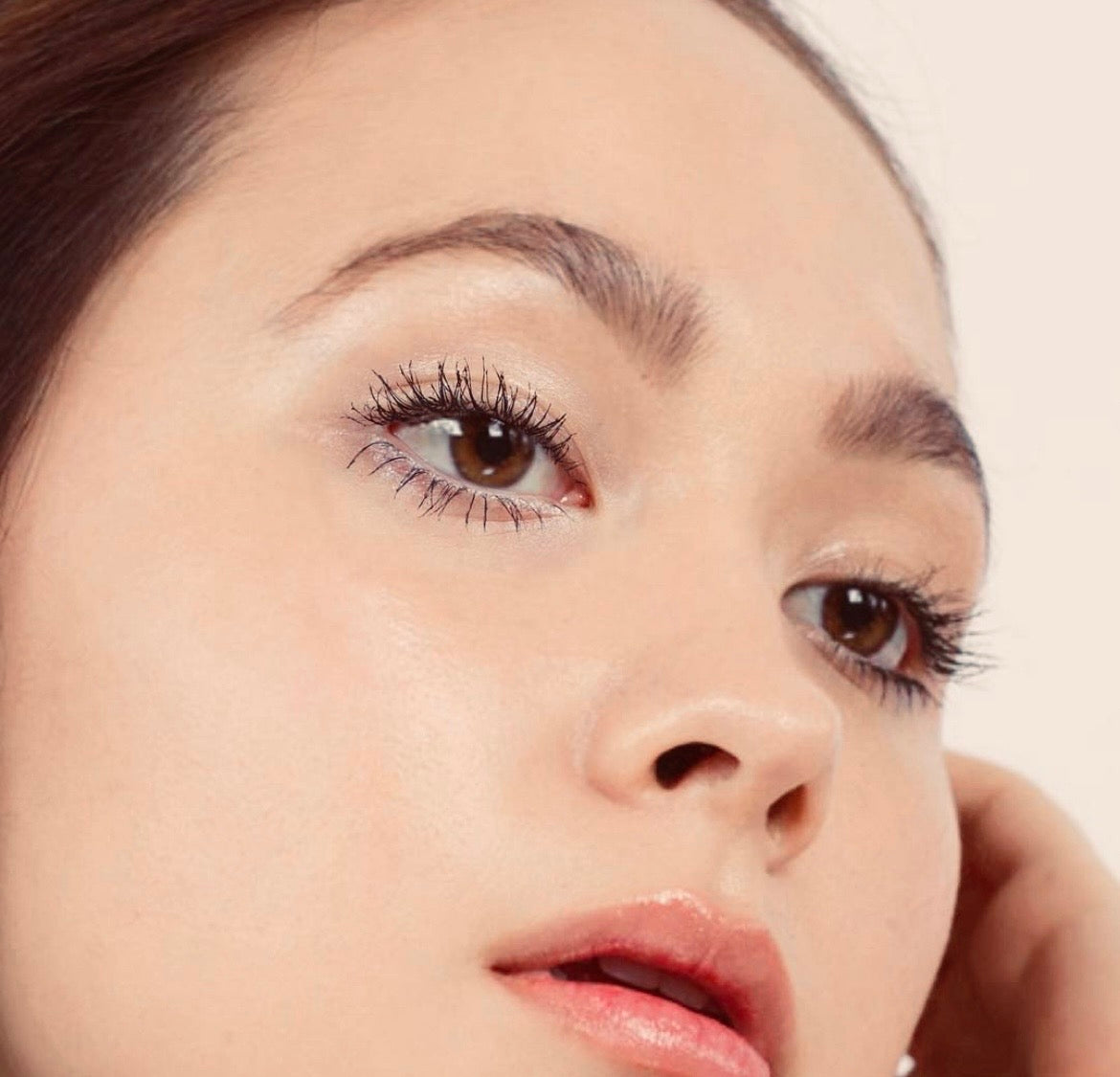 Close-up of a woman wearing LashFood Ultra Fine Brow Pencil Duo