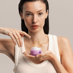 Woman holding Lavera Firming Day Cream