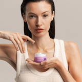 Woman holding Lavera Firming Day Cream