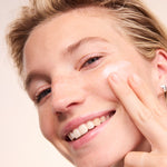 Woman applying Lavera Basis Sensitive Q10 Night Cream