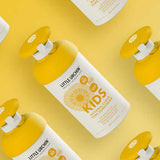 Little Urchin Kids Natural Clear Zinc Sunscreen SPF50+ 300g — yellow 300g pump bottles arranged on a yellow background.