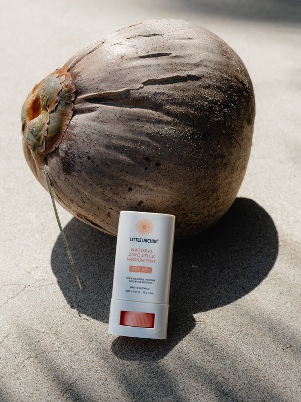 Little Urchin medium tint zinc stick styled with a coconut