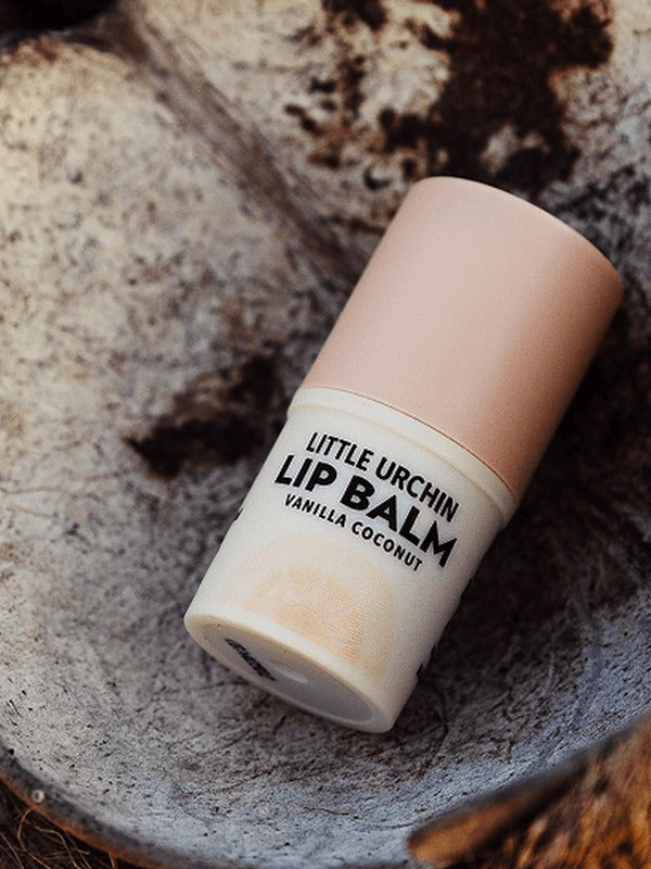 Little Urchin vanilla coconut lip balm styled with coconut