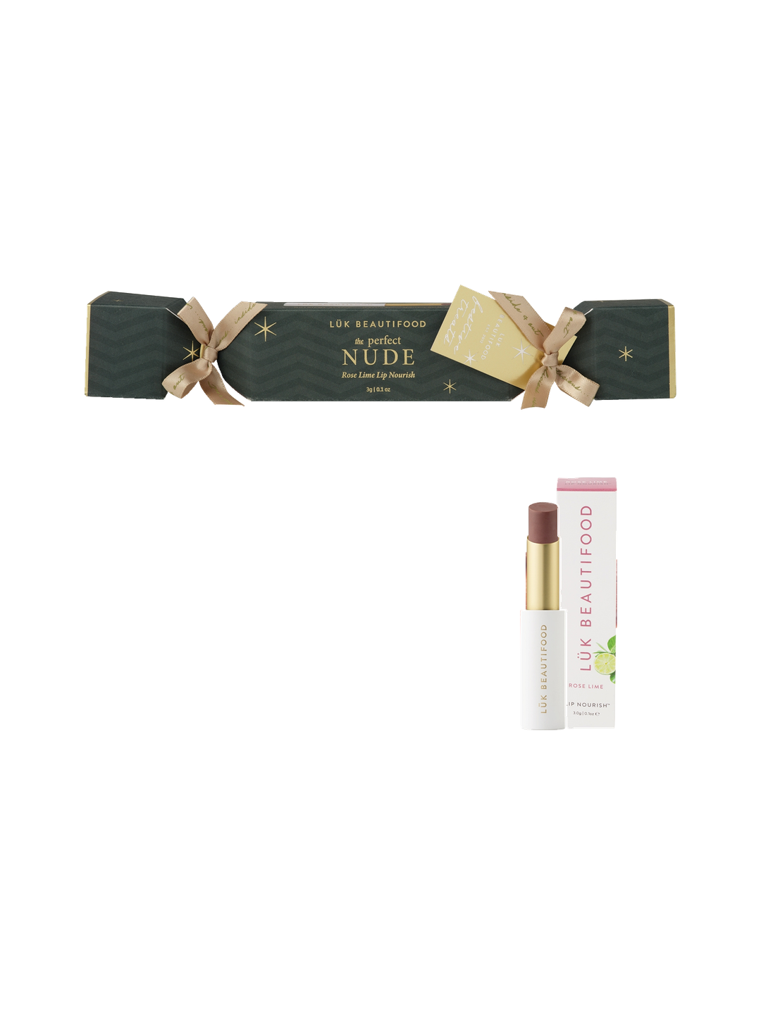 Luk Beautifood Bon Bon Lip Nourish Cracker in The Perfect Nude: a dark green cracker with gold ribbons and tag, shown with Rose Lime lipstick and its carton.