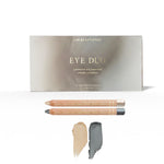 Soft Smoke Luminous Eye Crayon Duo: gift box, Pearl and Smoke wooden crayons, and matching pale vanilla-gold and deep silver-grey swatches.