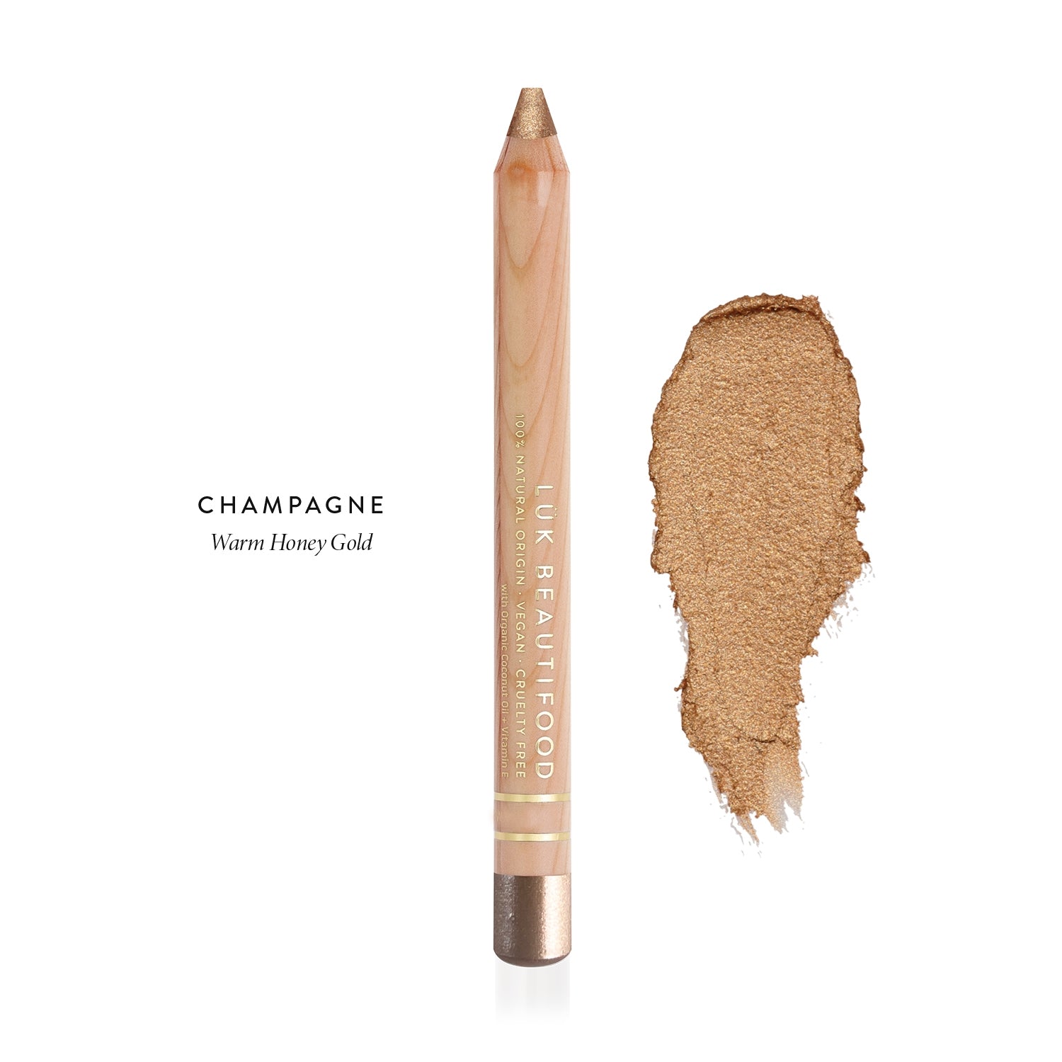 Luk Beautifood Luminous Eye Crayon in Champagne, a wooden pencil beside a shimmering honey-gold swatch labelled Warm Honey Gold.