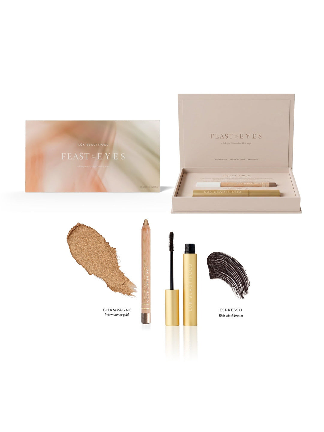 Feast for your Eyes Gift Set in Espresso and Champagne: open presentation box, gold mascara tube and wand, wooden eye crayon, and labelled brown and honey-gold swatches.
