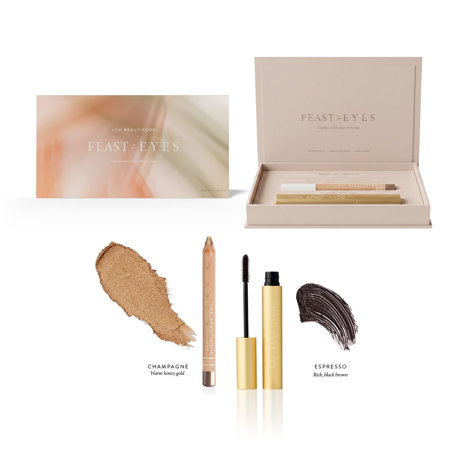 Feast for your Eyes Gift Set in Espresso and Champagne: open presentation box, gold mascara tube and wand, wooden eye crayon, and labelled brown and honey-gold swatches.