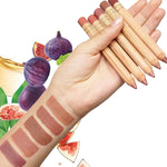 Luk Beautifood Lipstick Crayons held across a hand with all five shades swatched on an arm