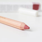 Close-up of a Luk Beautifood Lipstick Crayon revealing its rich berry shade