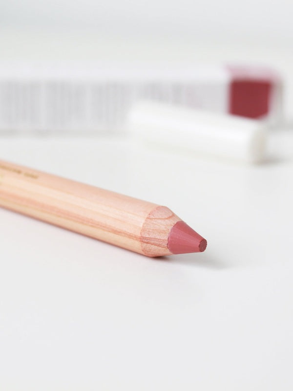 Close-up of a Luk Beautifood Lipstick Crayon revealing its rich berry shade