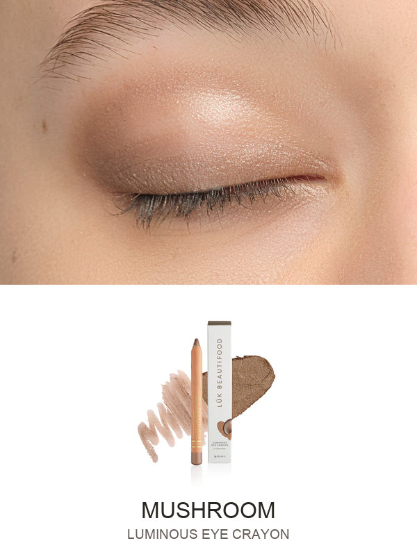 Luk Beautifood Luminous Eye Crayon in Mushroom: close-up of the shade on an eyelid above the matching crayon, carton and pigment swatch. Mushroom is labelled at the bottom.