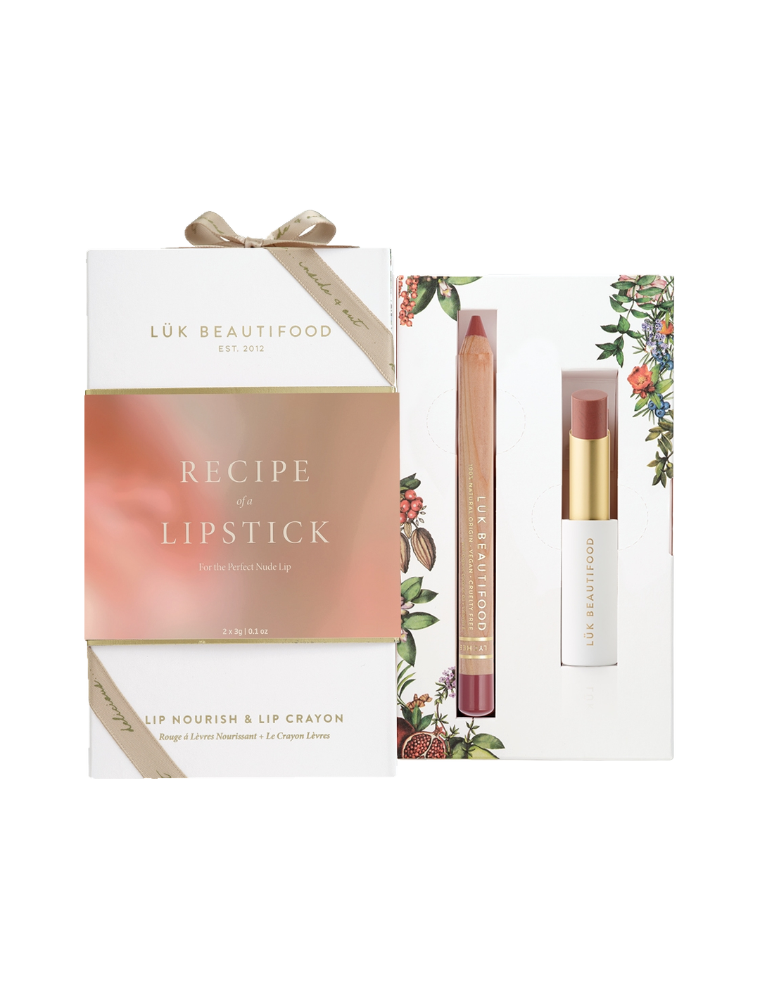 Luk Beautifood Recipe of a Lipstick Gift Set: ribboned white and rose-gold box beside an open botanical-print tray holding Tea Rose Lip Nourish and Lychee Sorbet Lipstick Crayon.