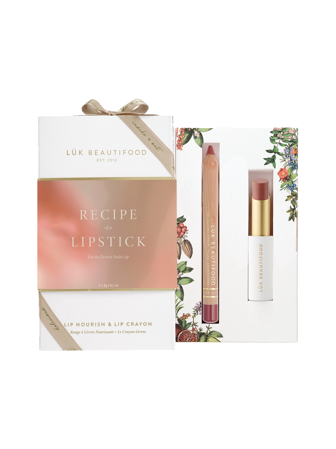 Luk Beautifood Recipe of a Lipstick Gift Set: ribboned white and rose-gold box beside an open botanical-print tray holding Tea Rose Lip Nourish and Lychee Sorbet Lipstick Crayon.
