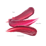Luscious Reds Lip Nourish Trio swatches labelled Rosé, Cherry Plum and Cranberry Citrus, showing wine-rose, vivid berry-red and rich cranberry-red colour.