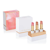 Sheer Delight Lip Nourish Trio, shown in packaging labelled Soft Shimmers, with Chai Shimmer, Guava Blush and Nude Sugar lipsticks and a pink-and-gold gift sleeve.