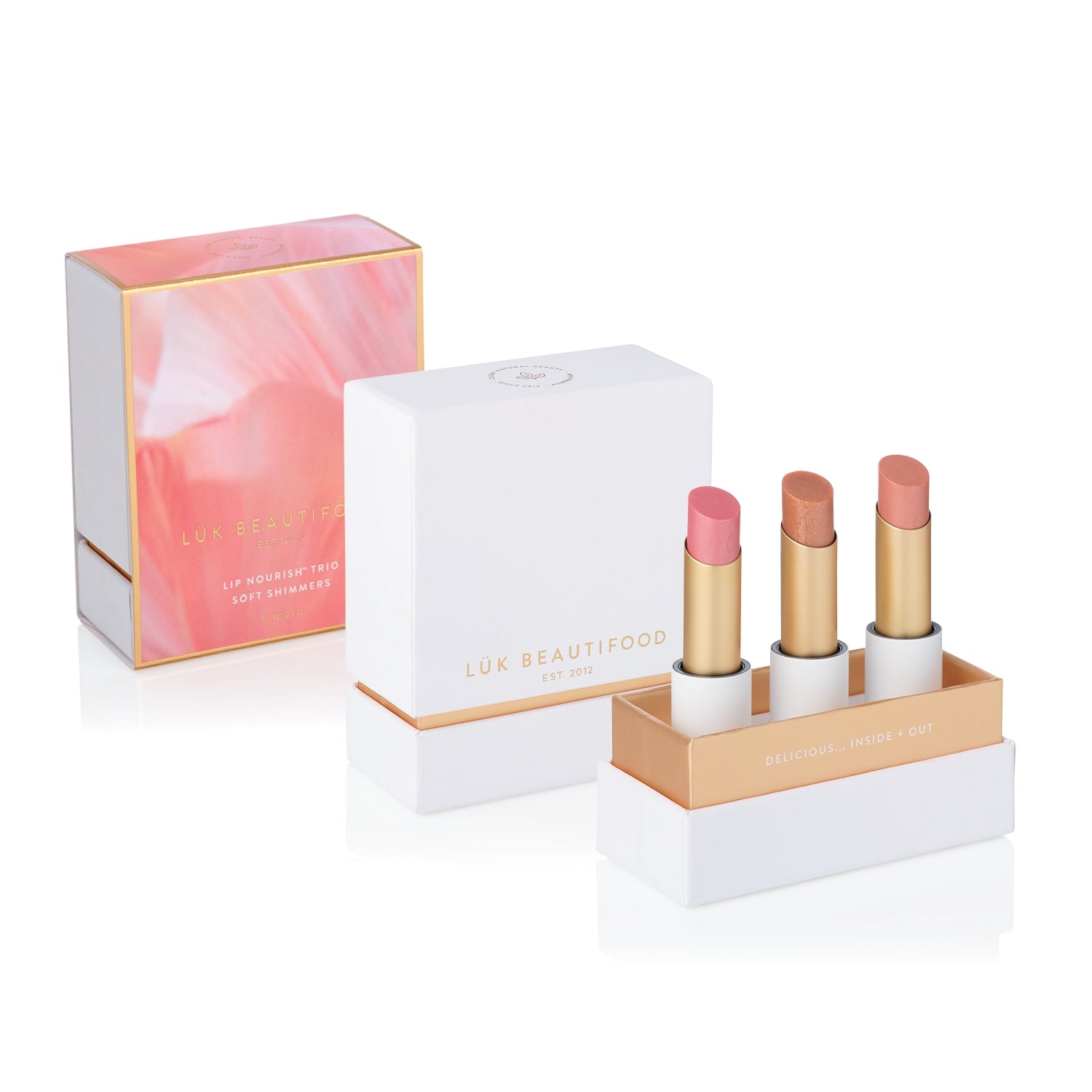 Sheer Delight Lip Nourish Trio, shown in packaging labelled Soft Shimmers, with Chai Shimmer, Guava Blush and Nude Sugar lipsticks and a pink-and-gold gift sleeve.