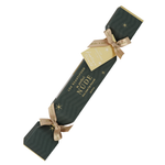 Single Luk Beautifood Rose Lime lip bonbon, a dark green Christmas cracker with gold ribbon bows and a gift tag, shown diagonally on white. The packaging reads The Perfect Nude.