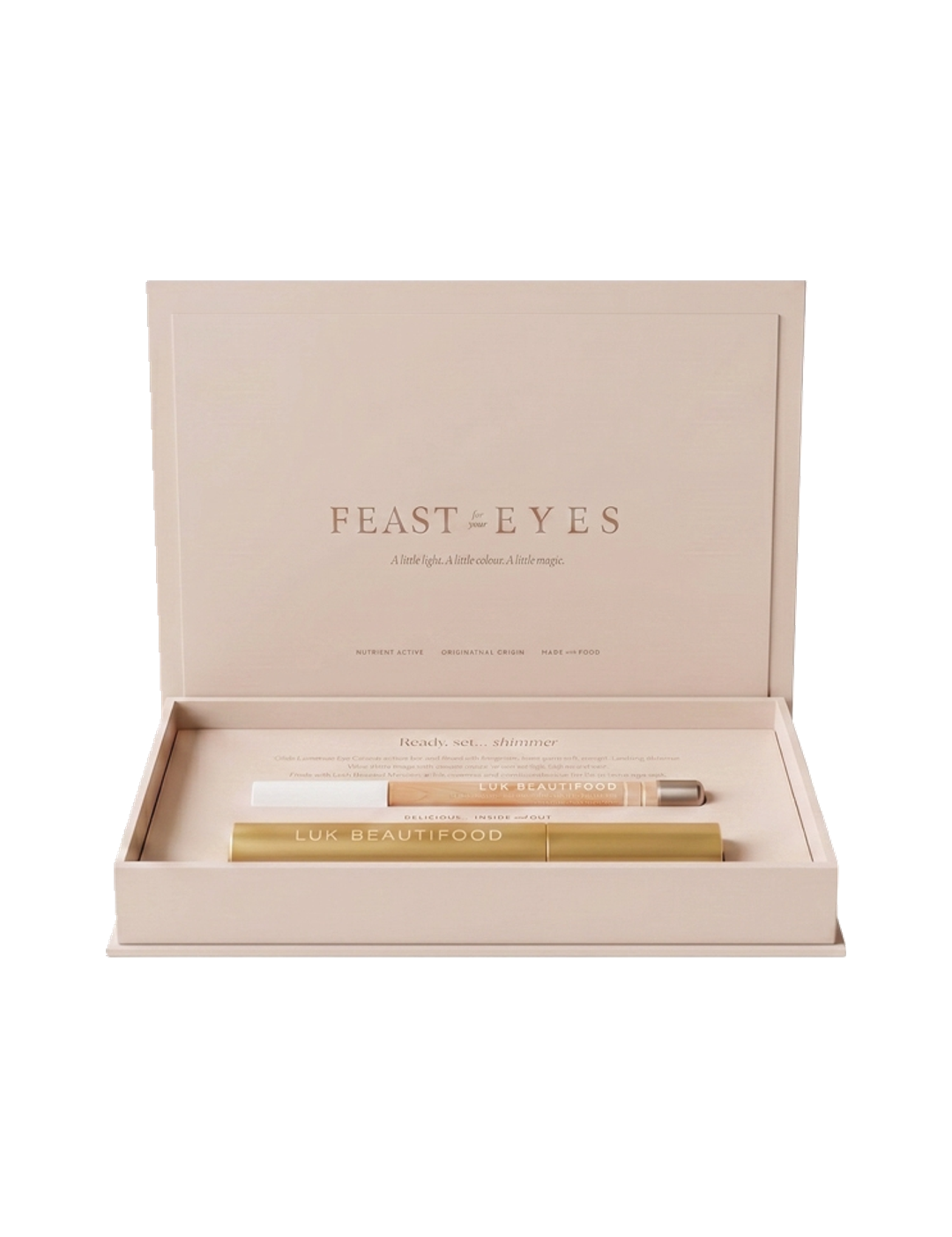 Luk Beautifood Feast for your Eyes Black Tea and Pearl gift set in one open cream gift box, with the lid raised above the gold mascara tube and pale eye crayon.