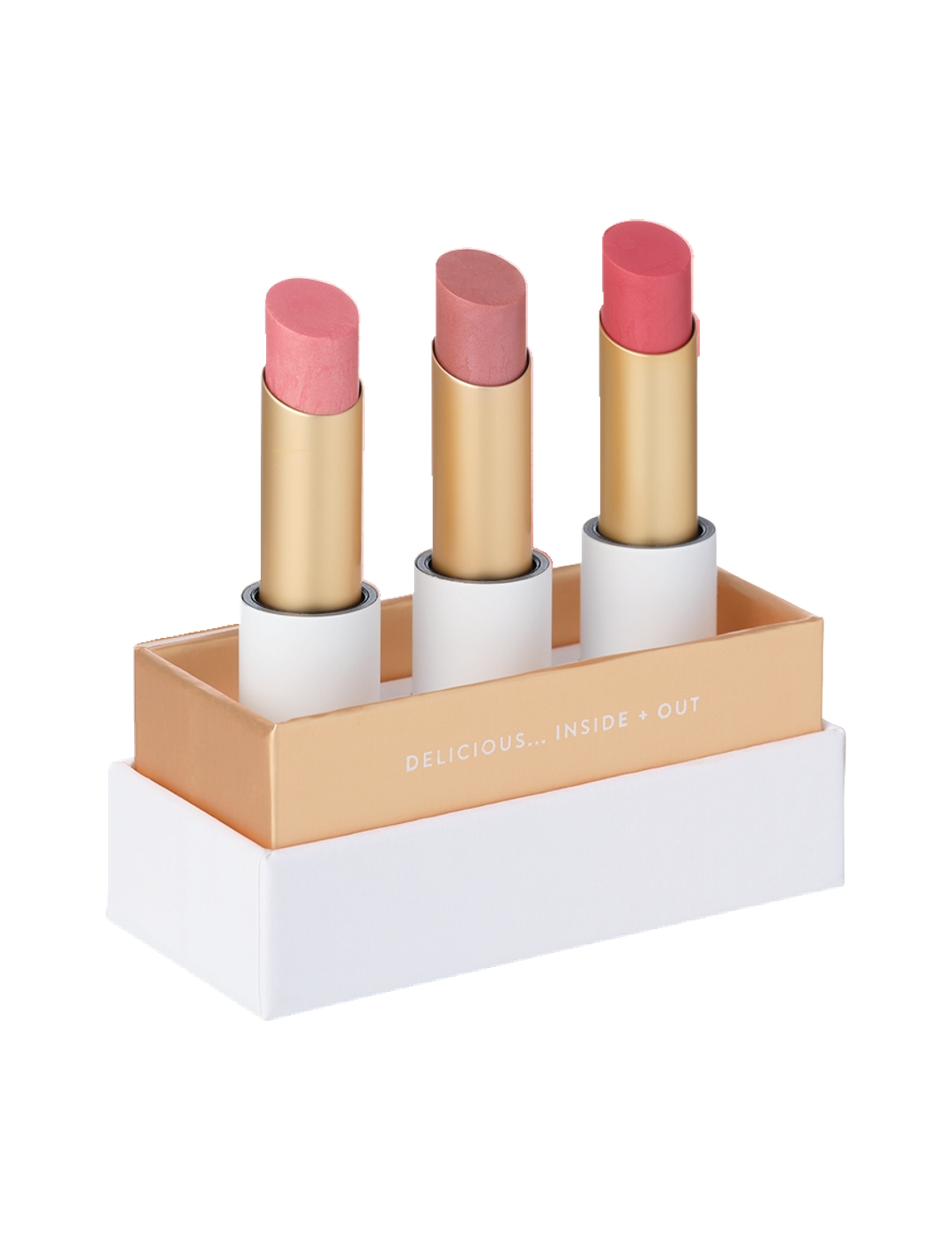 Luk Beautifood Lip Nourish Trio Buttery Pinks, with three uncapped pink lipsticks standing in a white presentation base with gold trim on a white background.