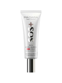 A white tube of Madara SOS Rich Hydra-Barrier CICA Cream 40ml with black and pink text and a silver cap, designed for very dry, stressed skin needing deep hydration and barrier support.