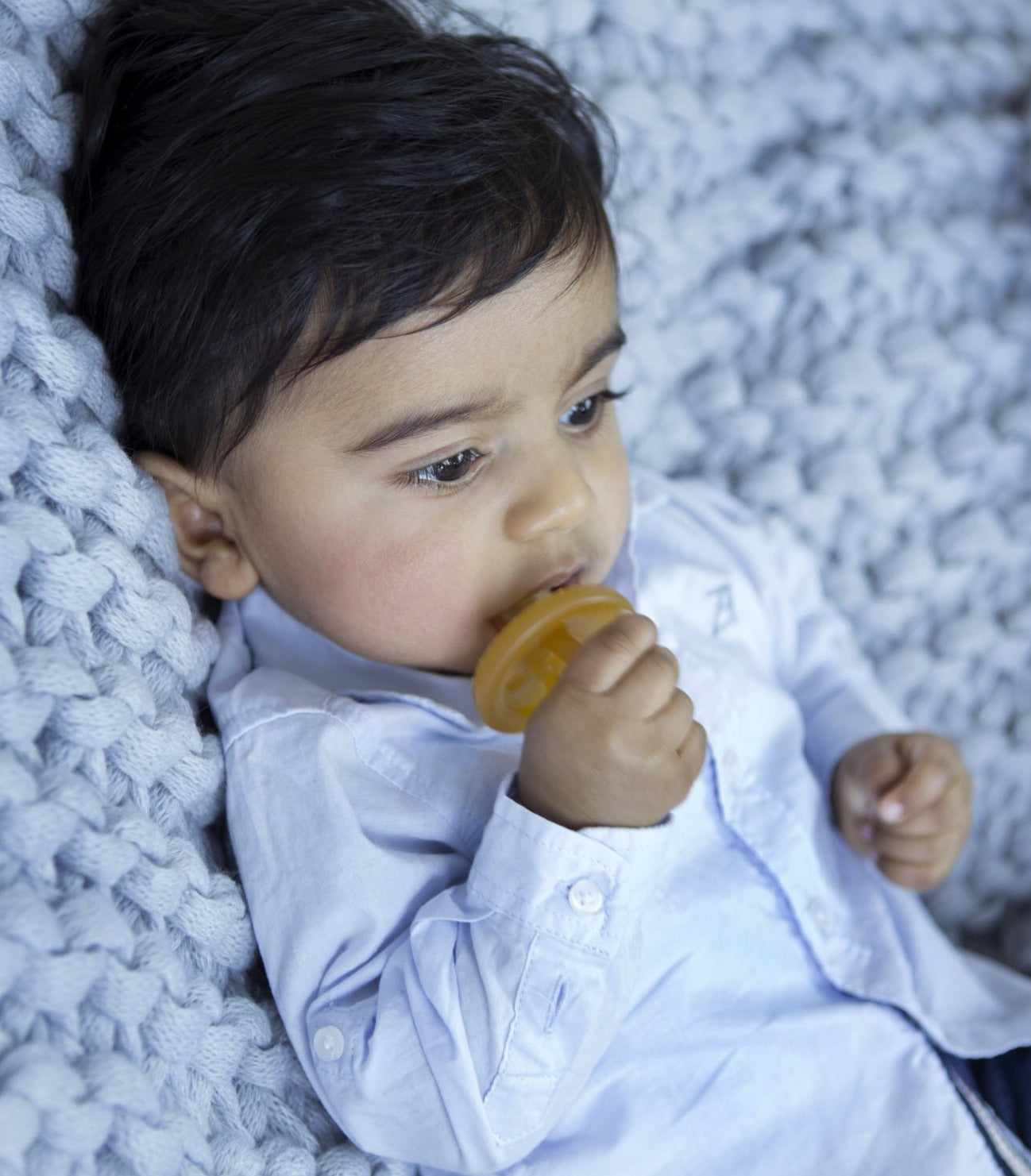 Toddler using a Natural Rubber Soother Orthodontic
