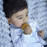 Toddler using a Natural Rubber Soother Orthodontic
